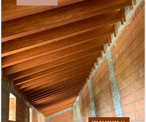 Realizzazione copertura in legno con travi in abete Lamellare a Verona.